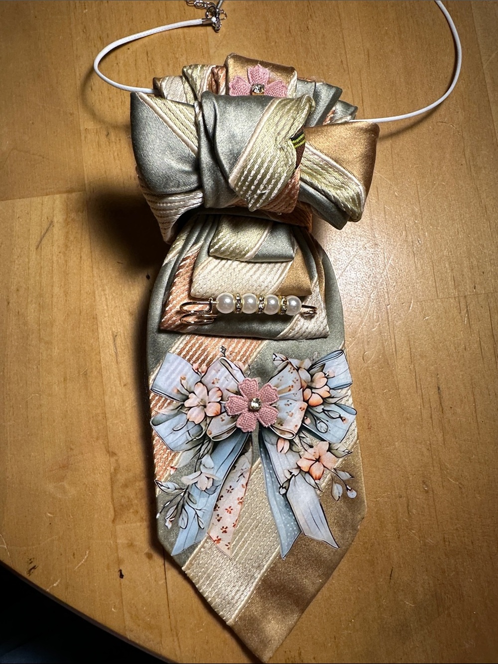 Beautiful Soft Colored Necklace Tie with Flower Motif and Pearls.